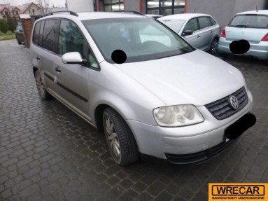 Купить Volkswagen Touran, 1.9, 2003 года с пробегом, цена 55086 руб., id 14679