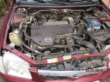 Купить Mazda 323, 2.0, 1998 года с пробегом, цена 1592 руб., id 15424